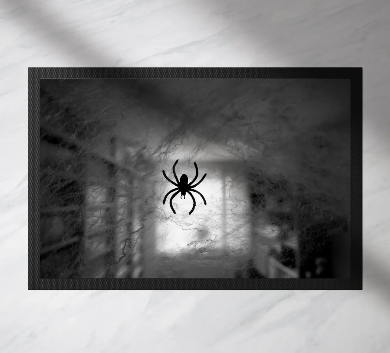 The spider deurmat van Massimo Frascogna