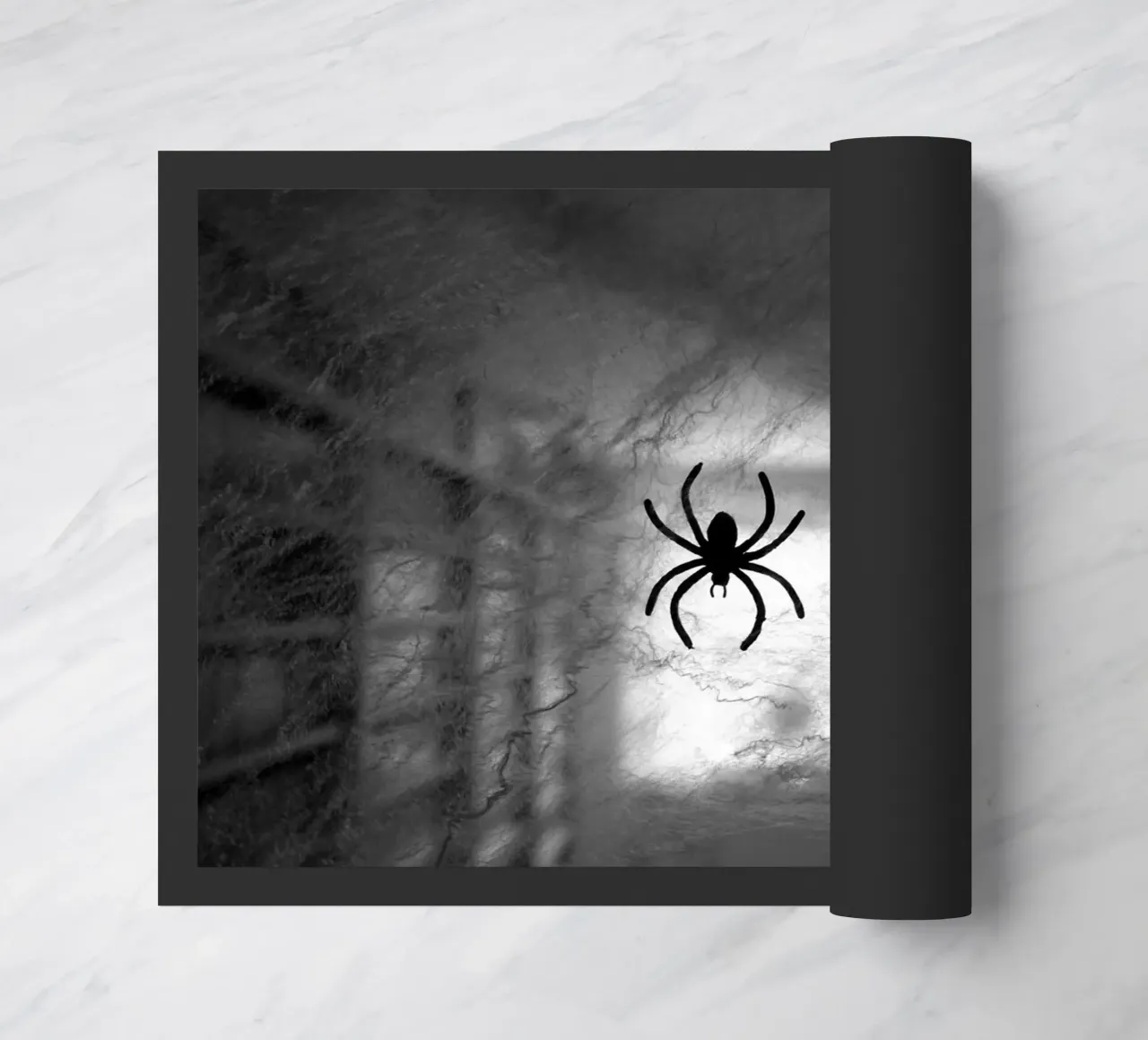 The spider deurmat van Massimo Frascogna