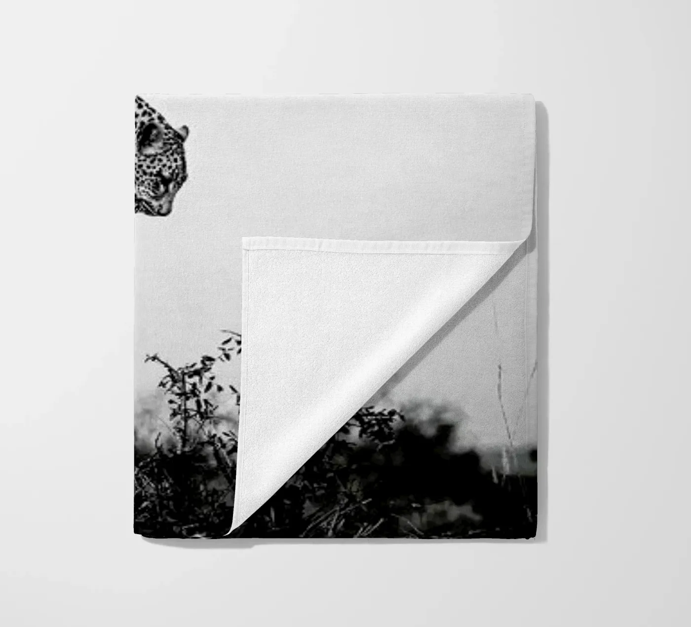 Pouncing Leopard beach towel by Natural Kingdom