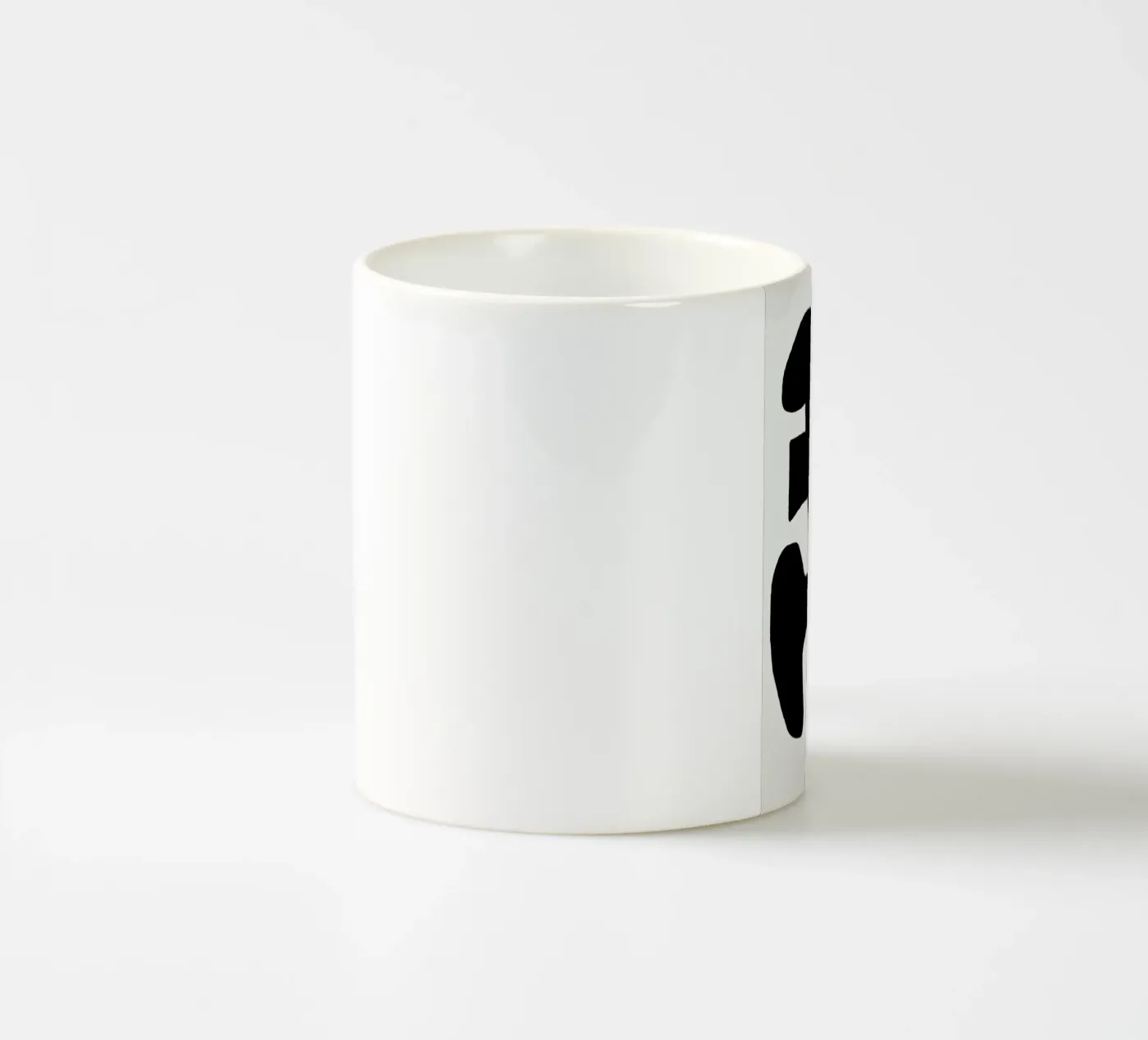 Black Spring ceramic mug by Tanja Schaub