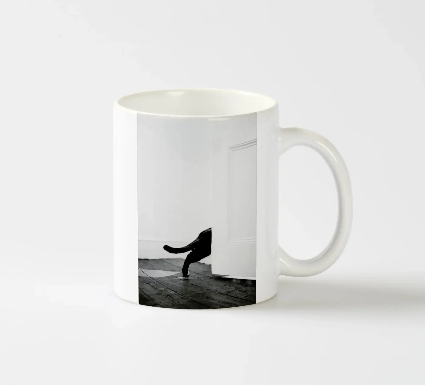 Sneaking Out ceramic mug by METROPOLIS