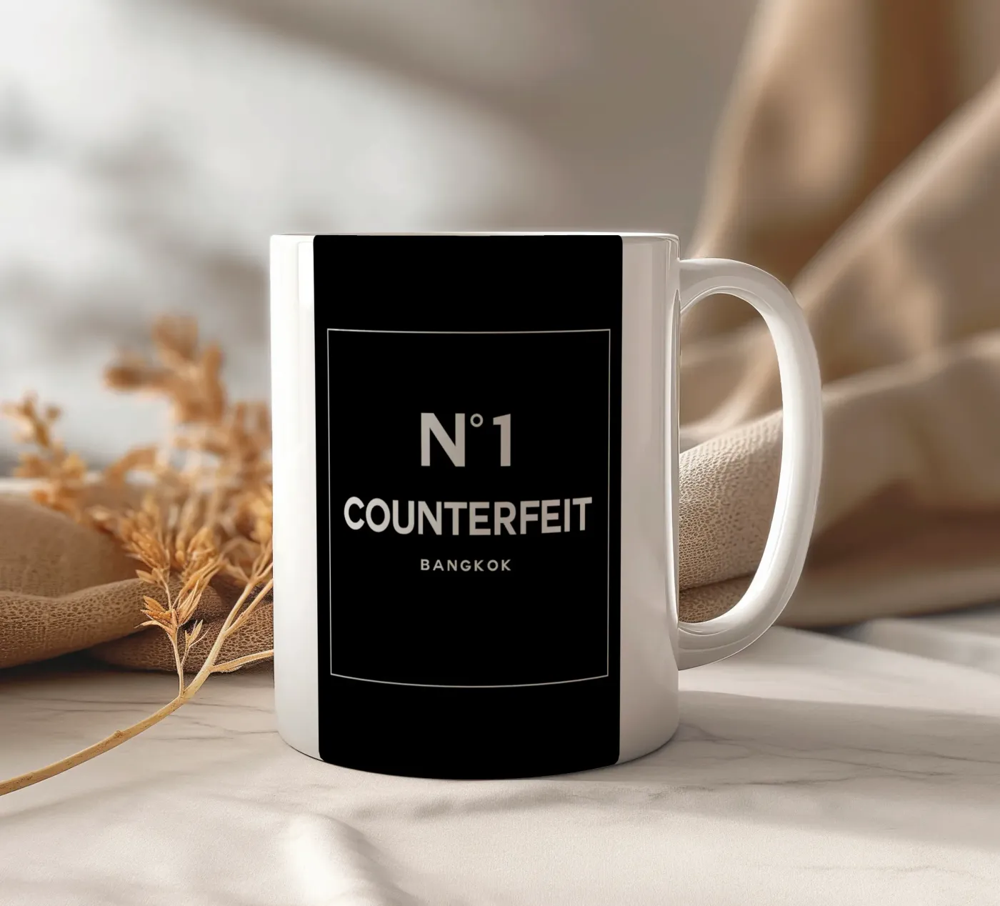 Counterfeit ceramic mug by 121 Creatives