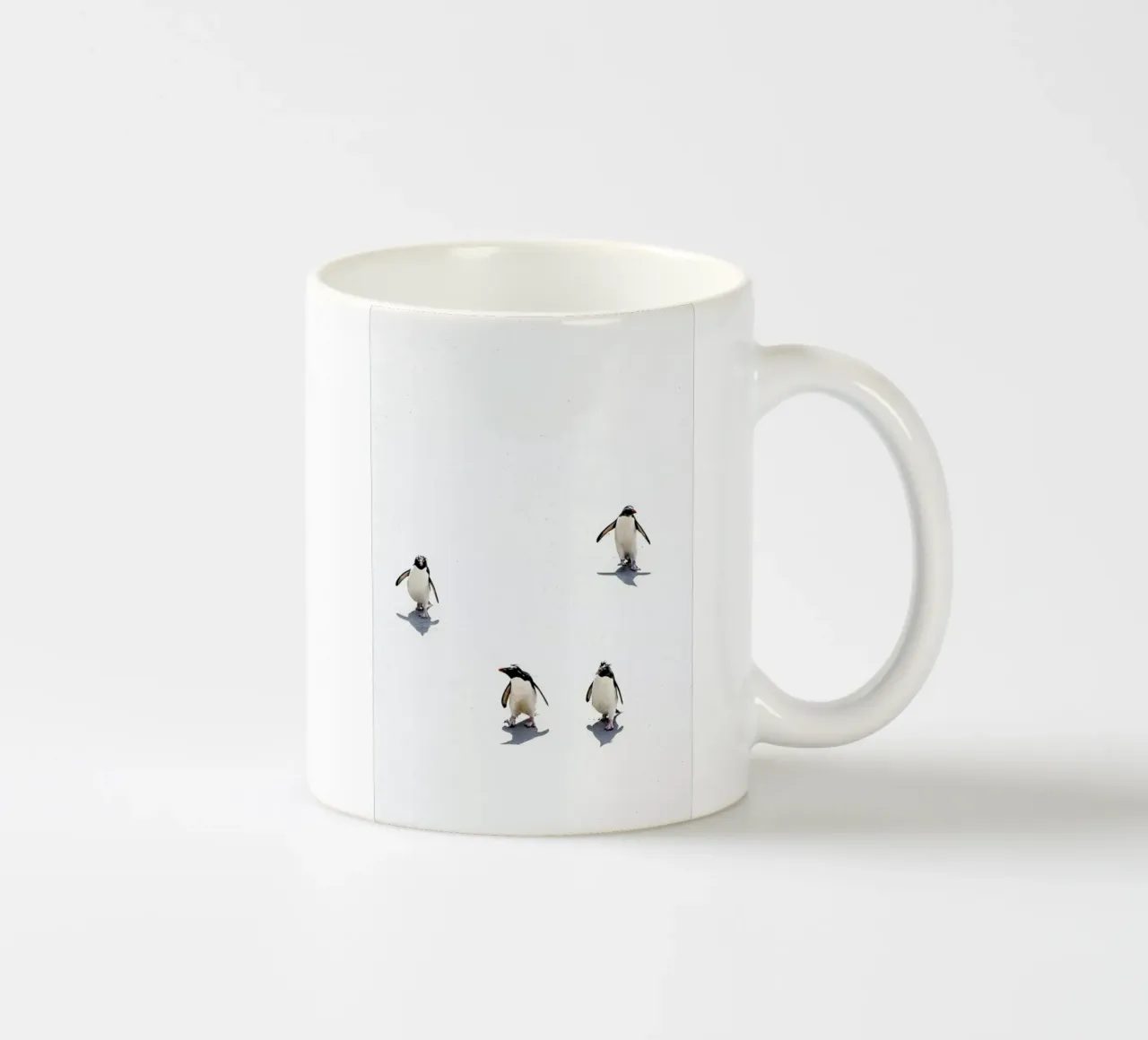 Snow Penguins II tazza in ceramica da Natural Kingdom