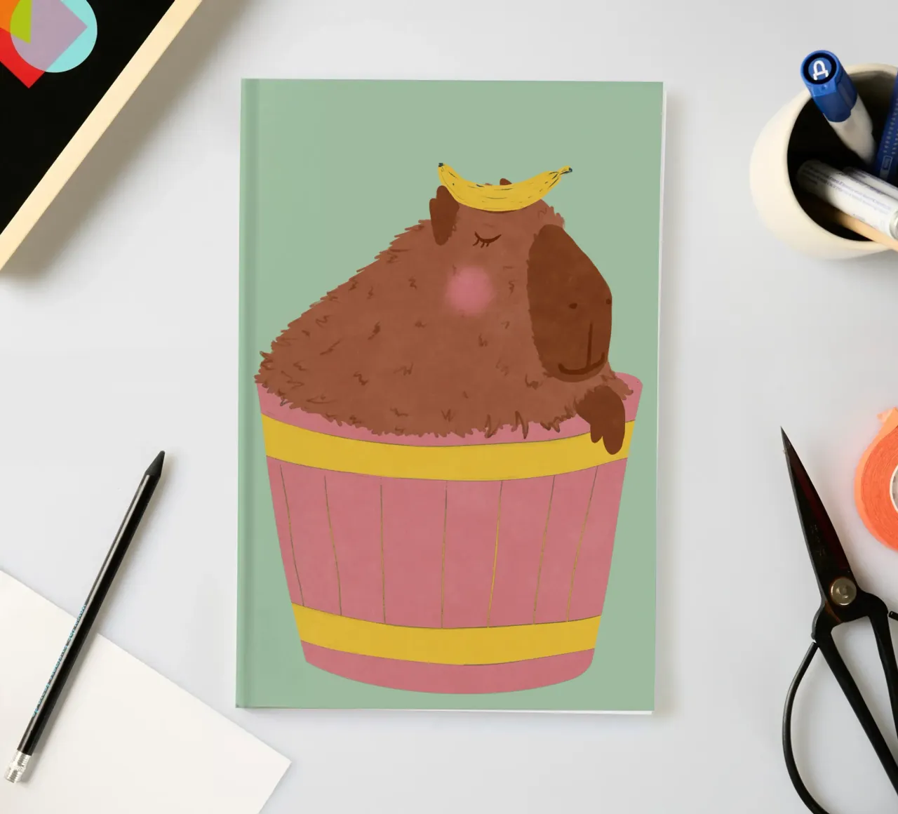 Capybara with Banana notebook by Illustration Raissa Oltmanns