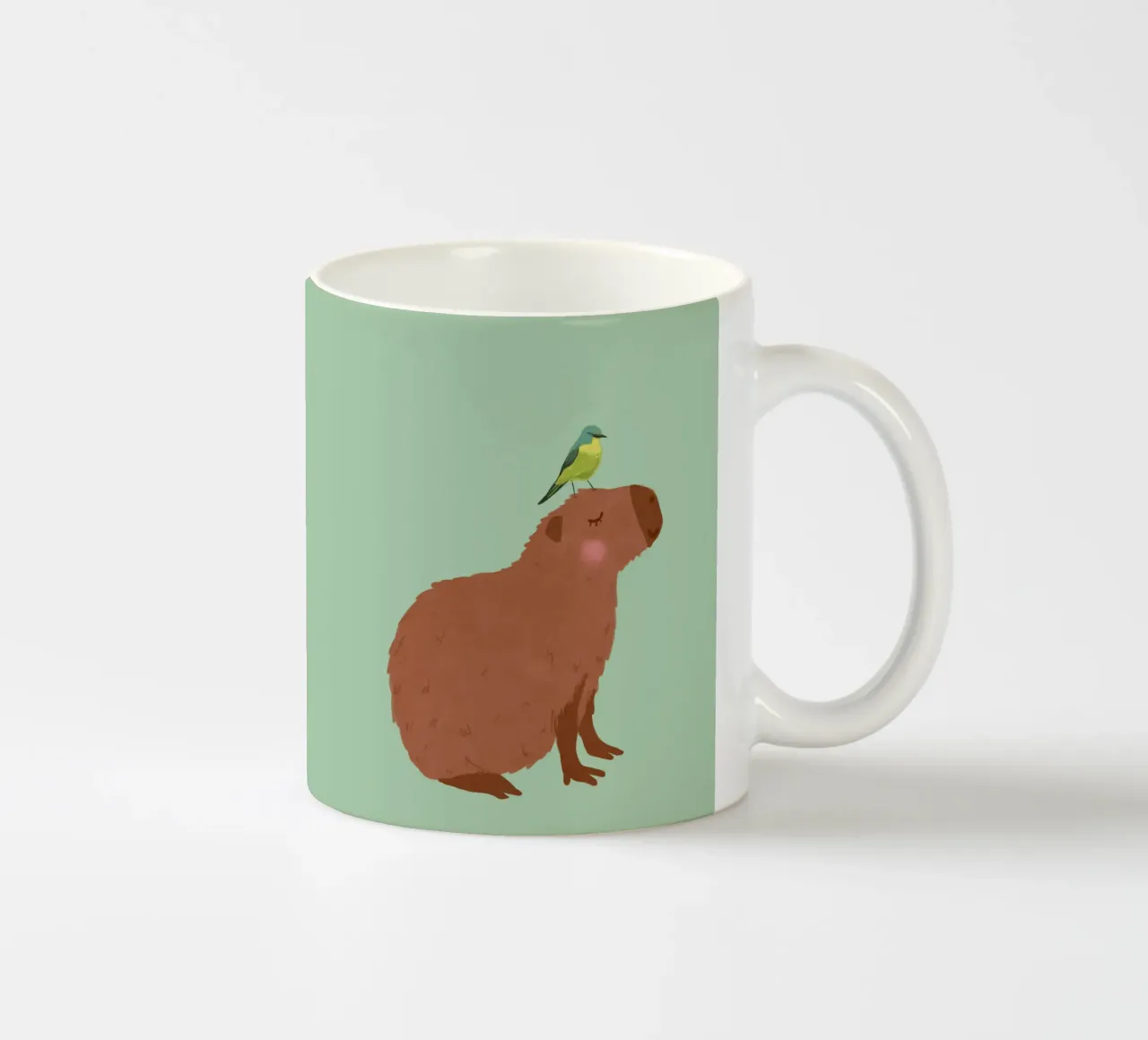 Capibara con uccello tazza in ceramica da Illustration Raissa Oltmanns