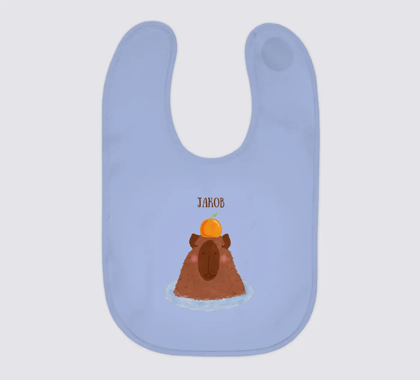 Capybara mit Orange Babylätzchen von Illustration Raissa Oltmanns