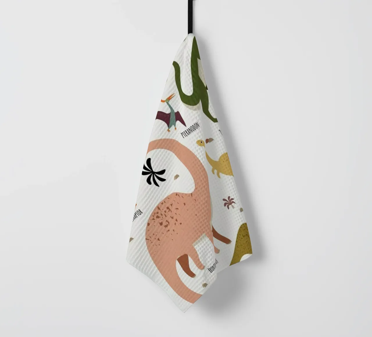 Dinosaur Friends tea towel by Little Flourishes