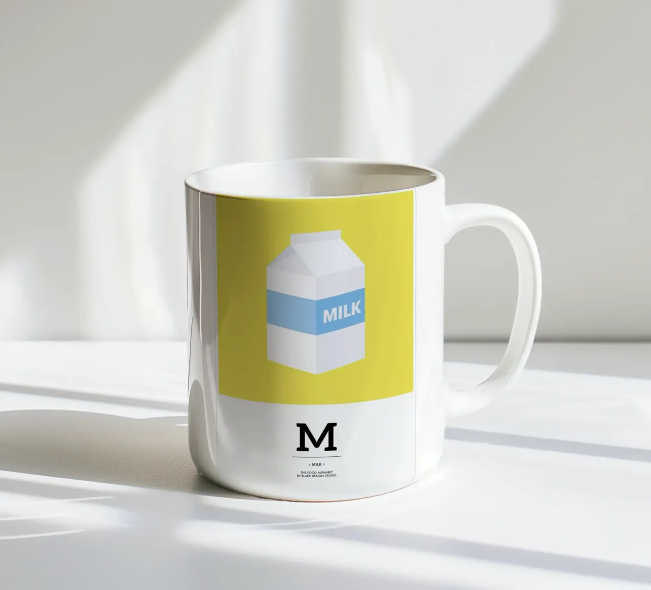 „The Food Alphabet“ - M like Milk tazza in ceramica da BLAEK Design Studio