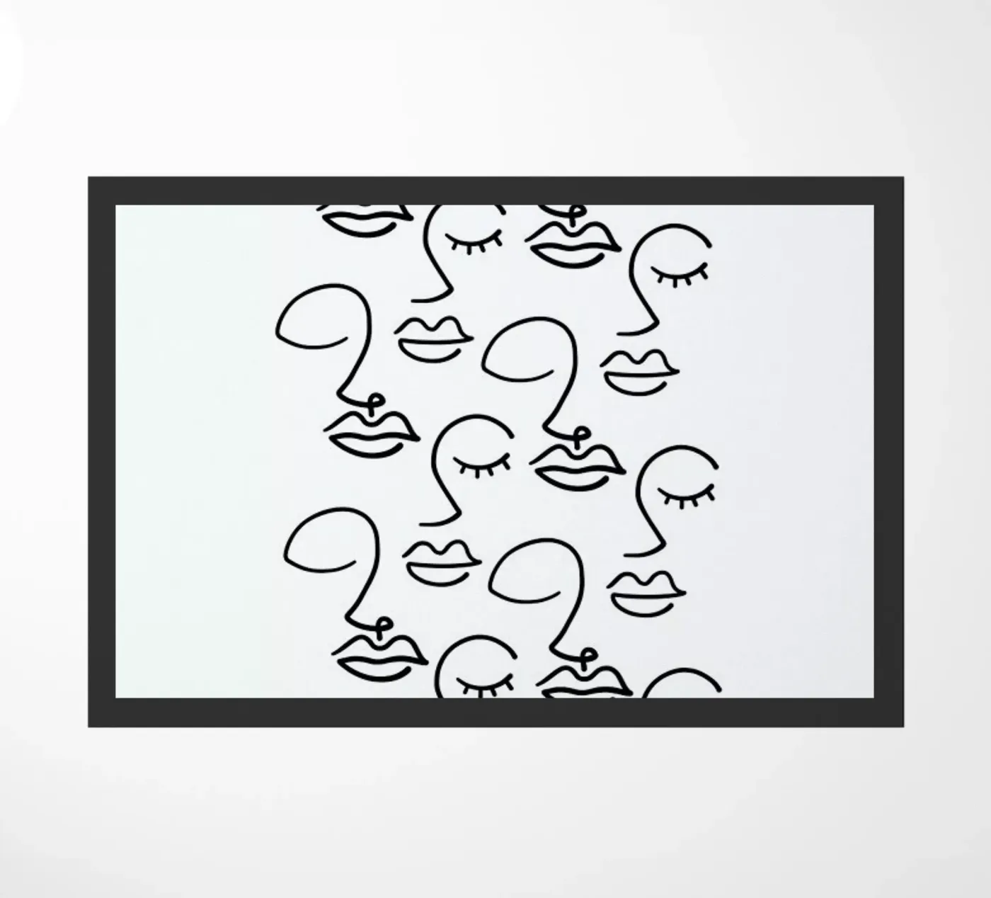 Faces doormat by Ninhol