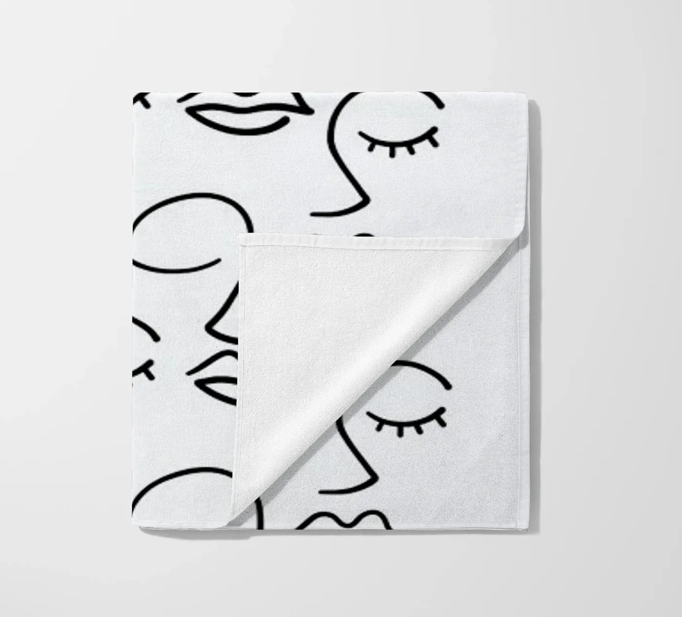 Faces strandhanddoek van Ninhol
