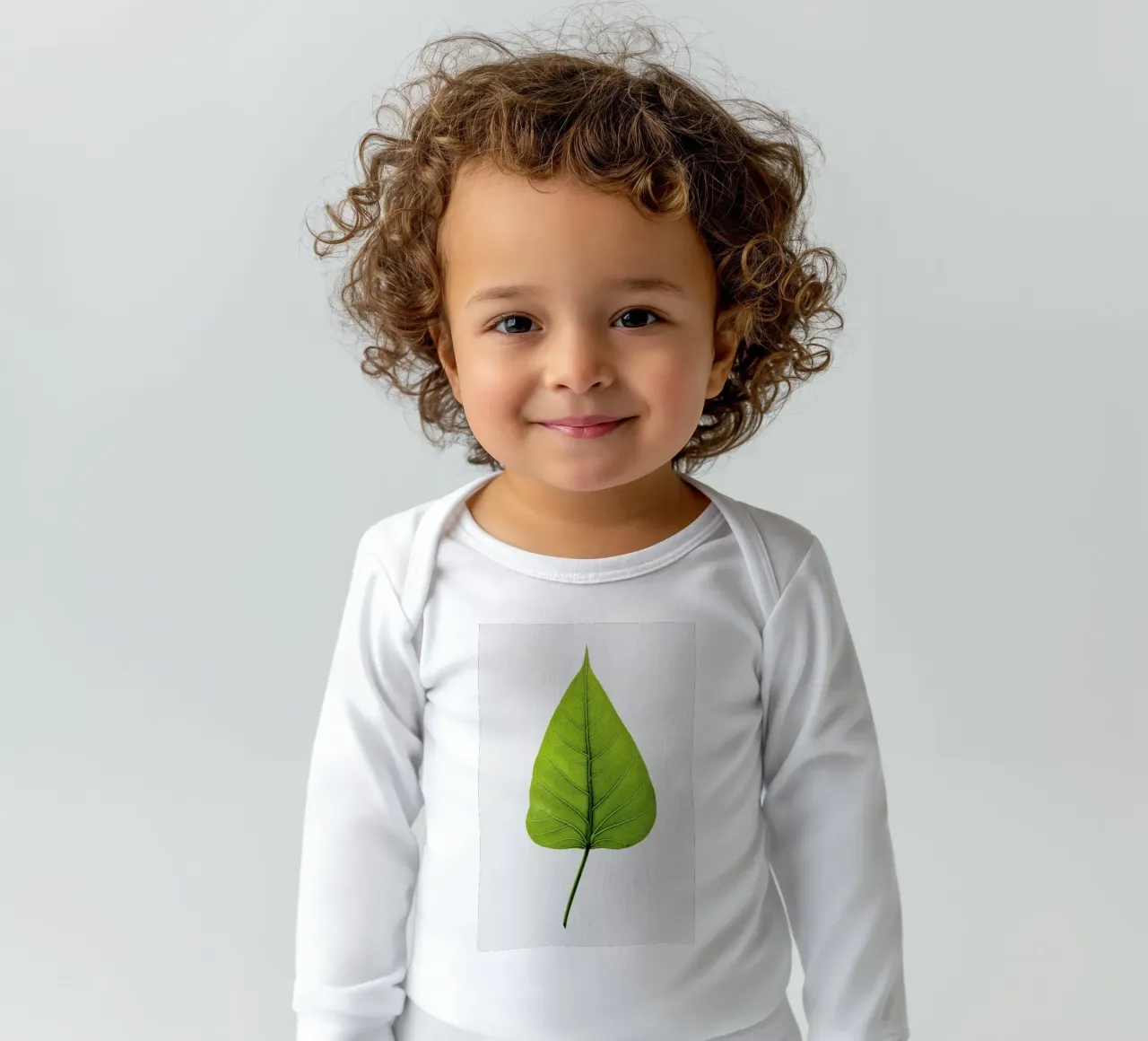 Religiosa long-sleeve baby romper by Shot By Clint
