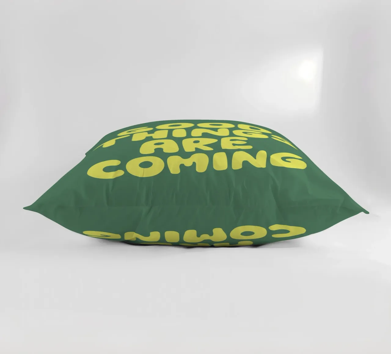 Good Things Are Coming Typography Print in Green and Yellow decorative cushion by THE MOTIVATED TYPE