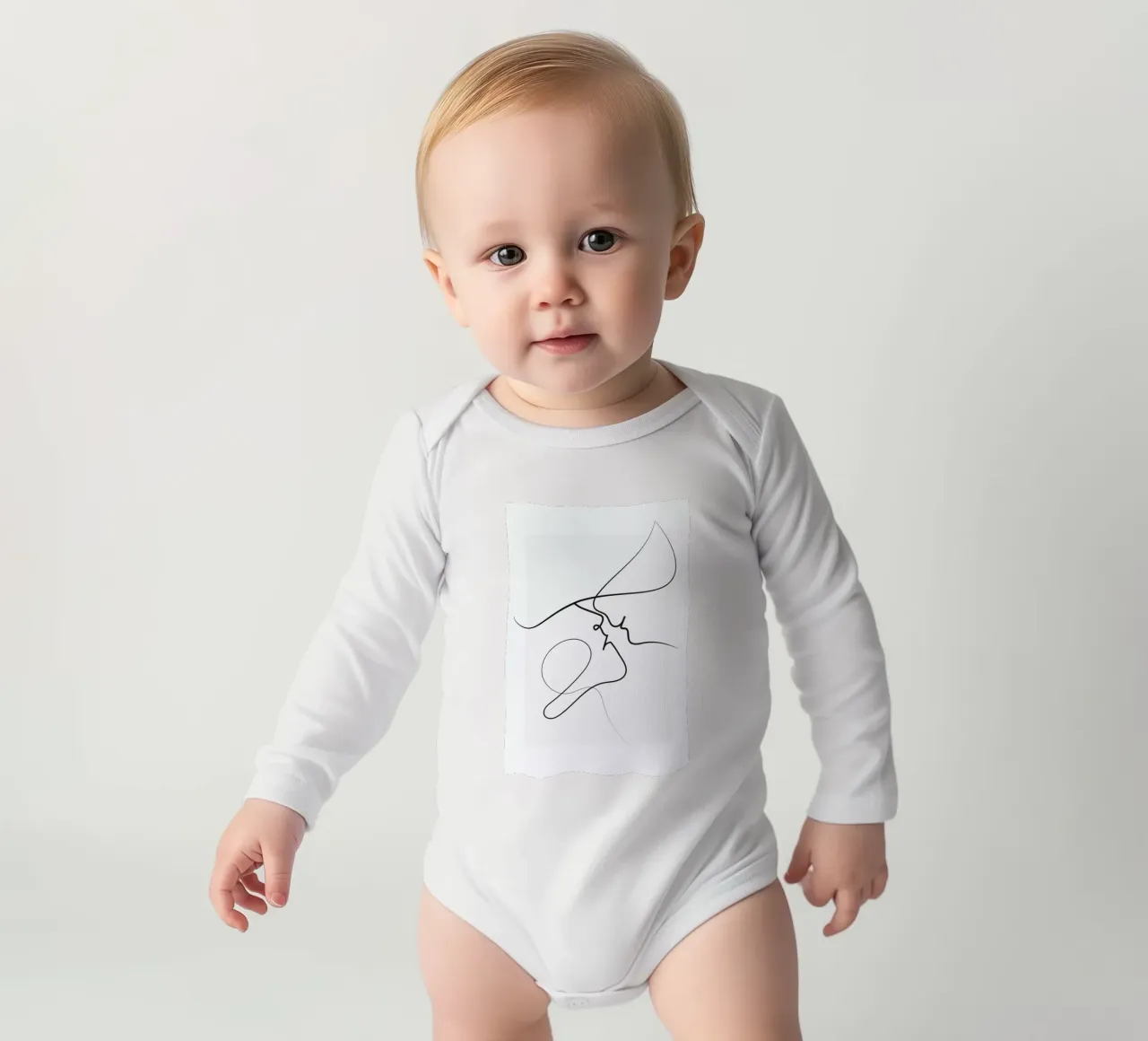 Playful long-sleeve baby romper by Graphite
