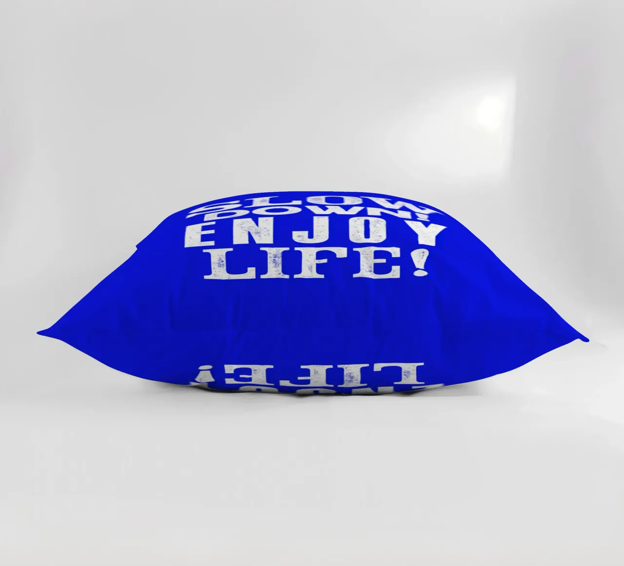 Slow Down Enjoy Life Typography Print in Blue and White decorative cushion by THE MOTIVATED TYPE