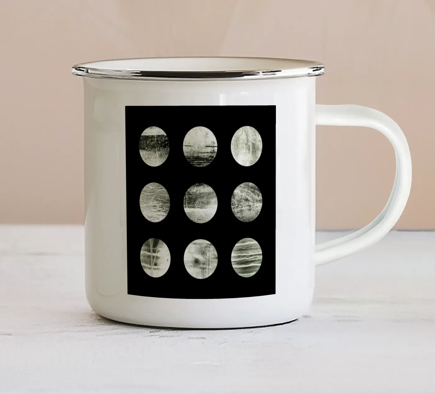 Moons enamel mug by Elisabeth Fredriksson