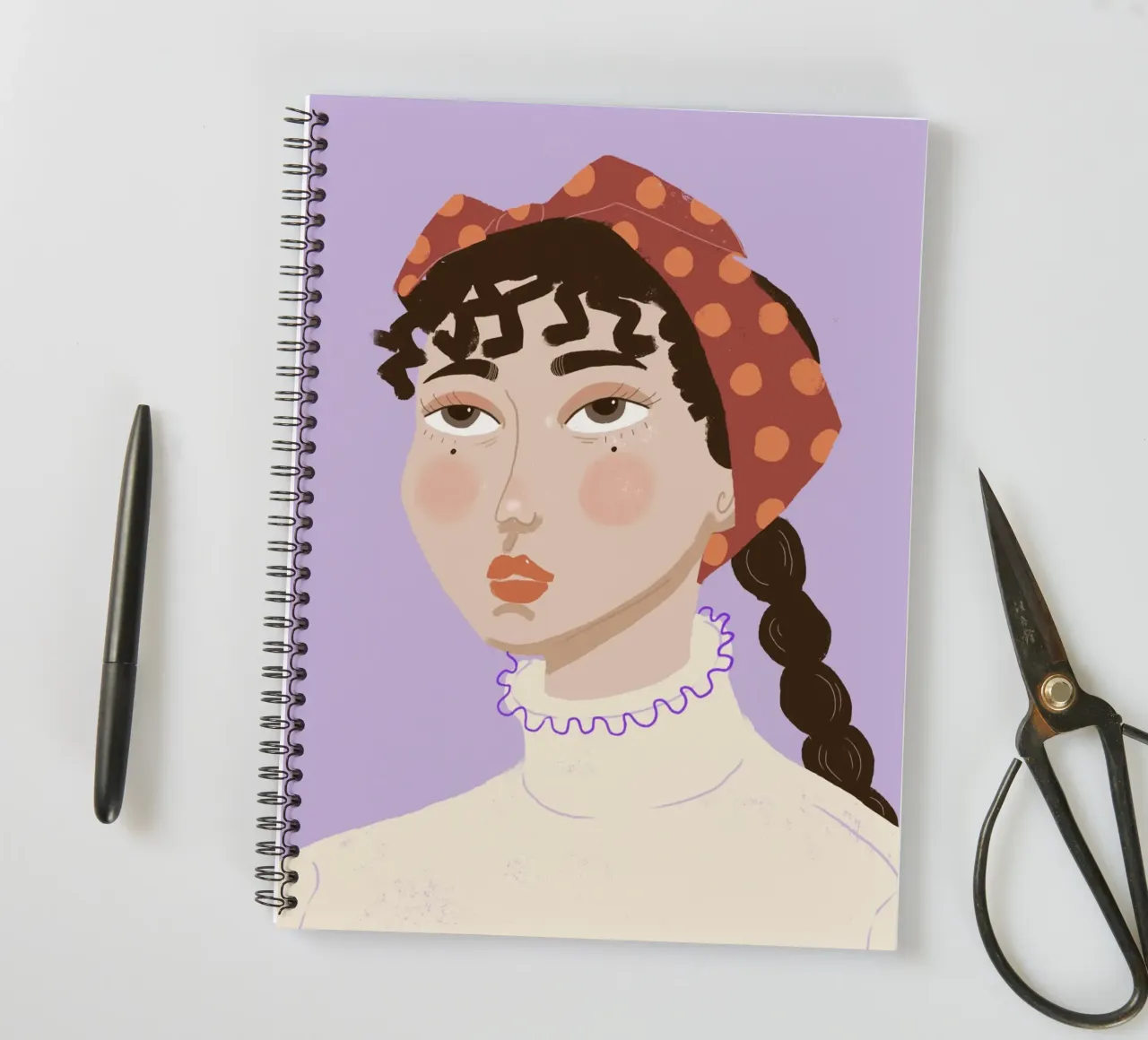 Ritratto con sciarpa diario ad anelli da ANIPI studio graphique