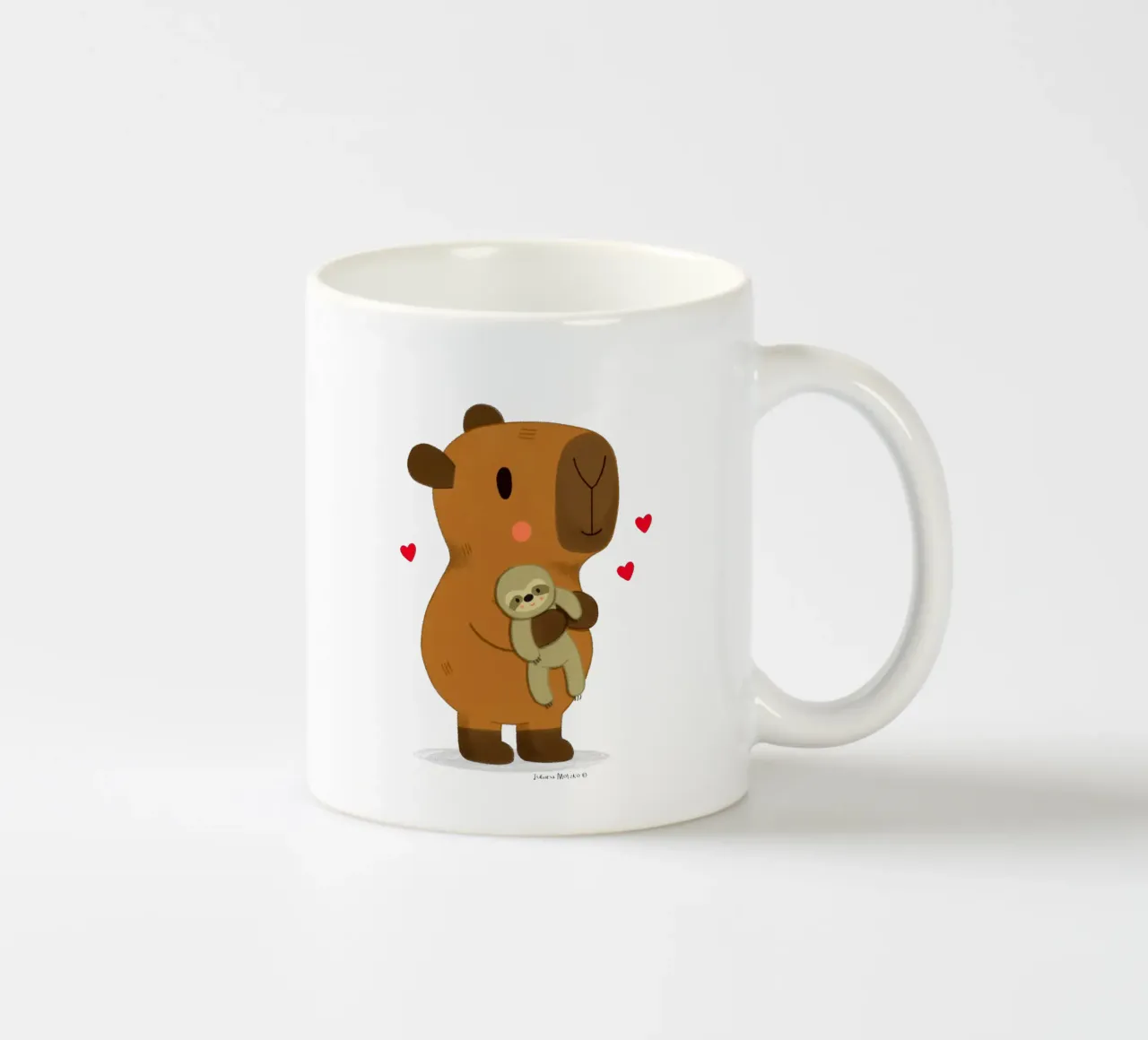 Capybara hugging a sloth plushie toy ceramic mug by julianamotzko