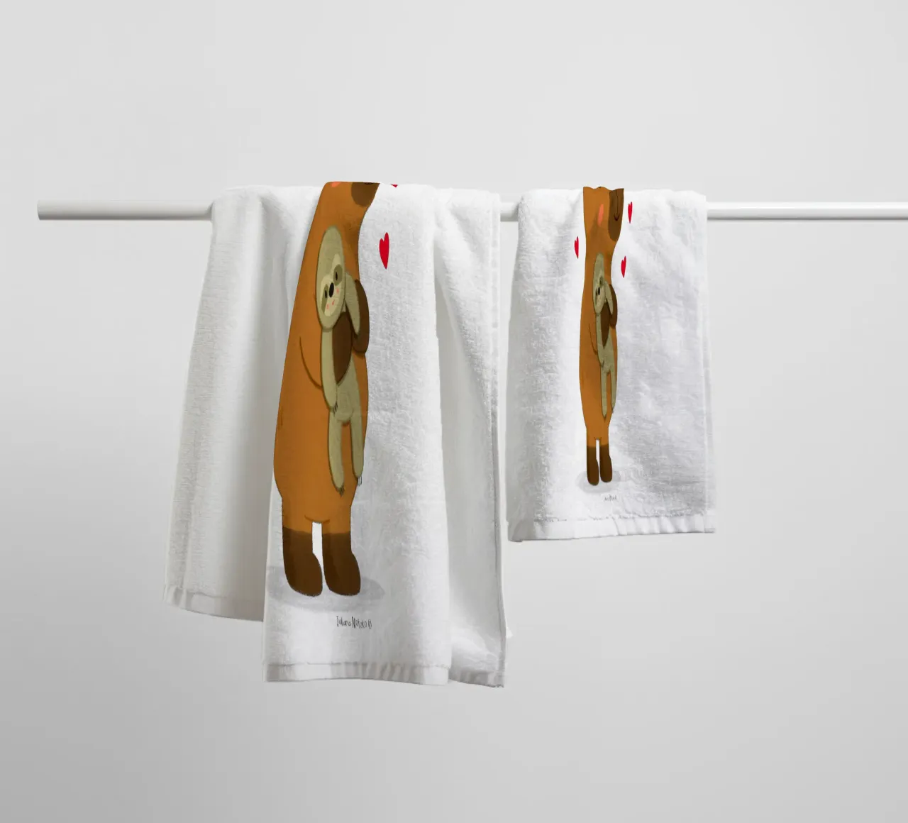 Capybara hugging a sloth plushie toy towel by julianamotzko