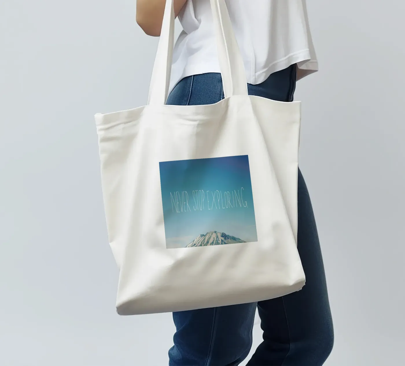 Never Stop Exploring tote bag by Leah Flores