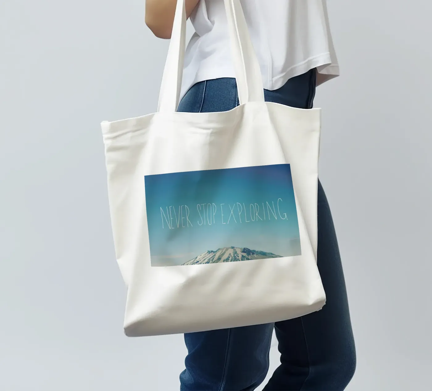 Never Stop Exploring tote bag by Leah Flores