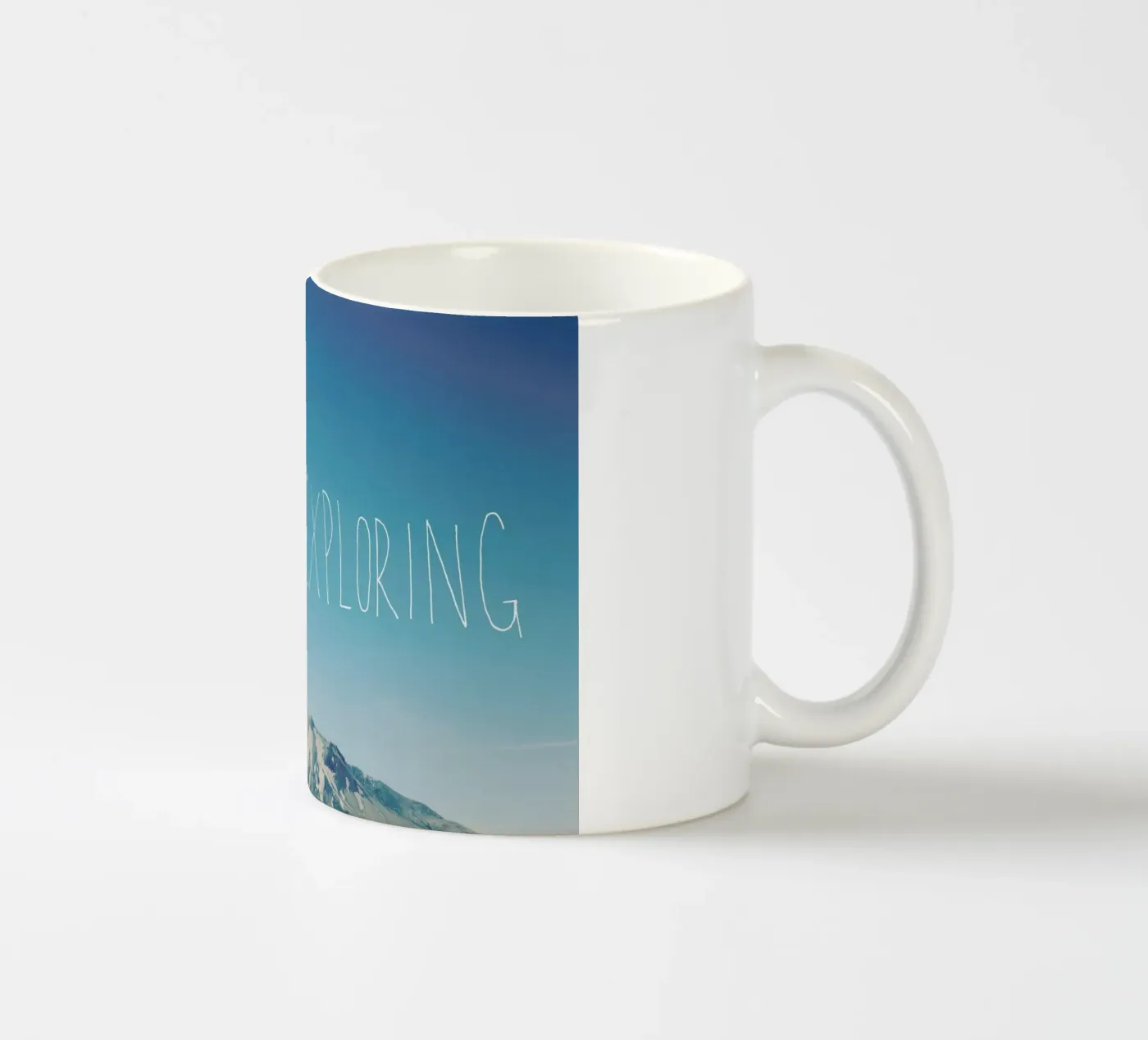Never Stop Exploring ceramic mug by Leah Flores