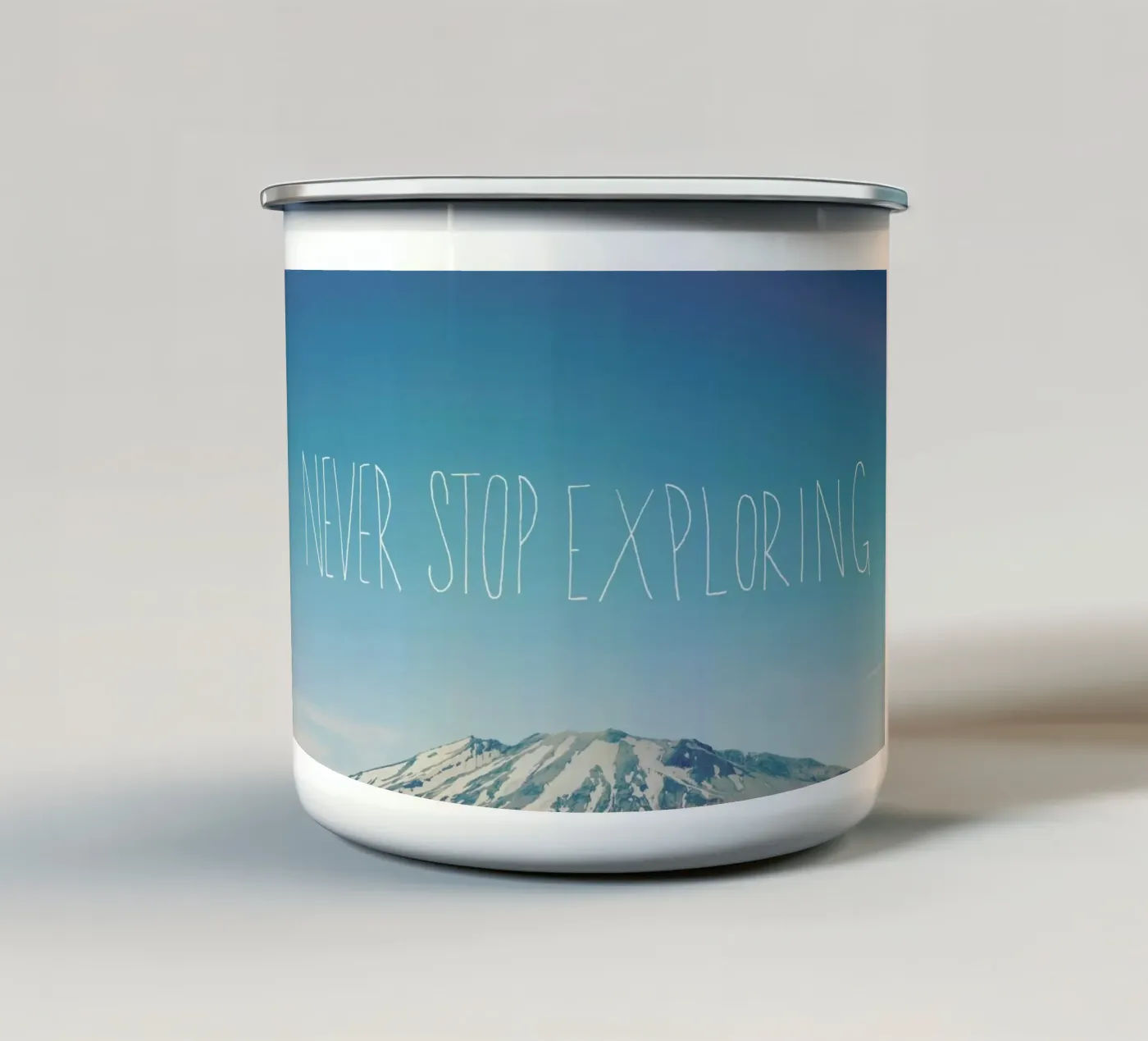 Never Stop Exploring enamel mug by Leah Flores