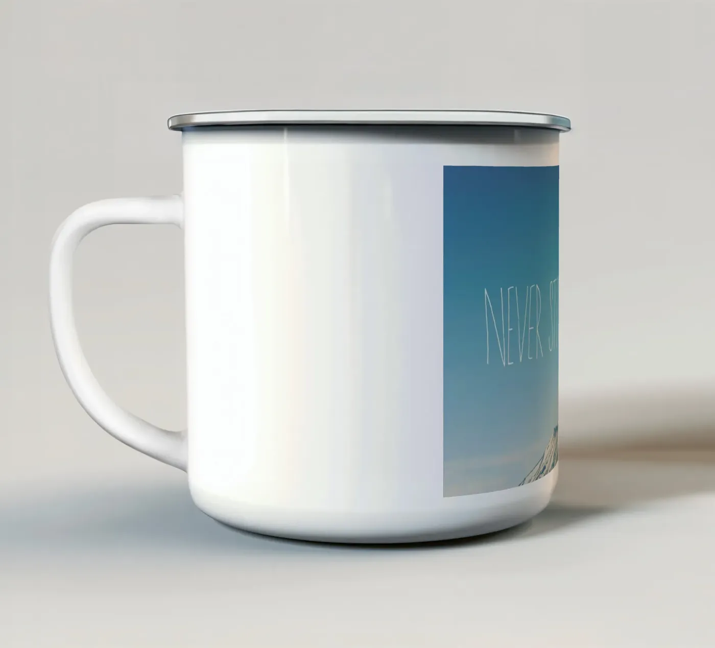 Never Stop Exploring enamel mug by Leah Flores
