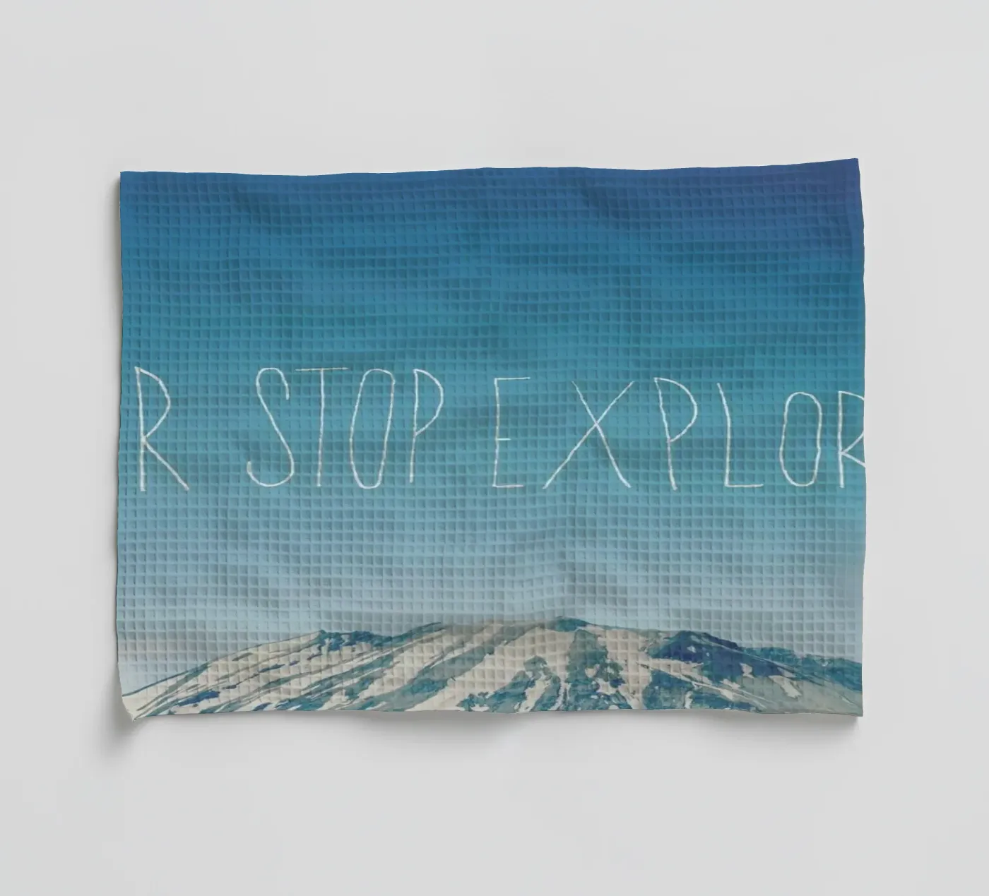 Never Stop Exploring tea towel by Leah Flores