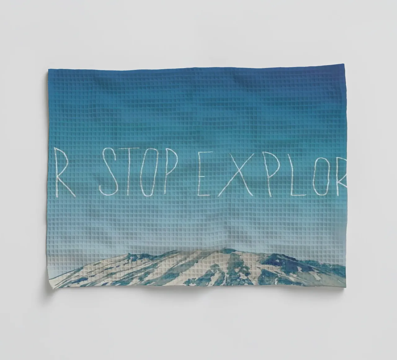 Never Stop Exploring tea towel by Leah Flores