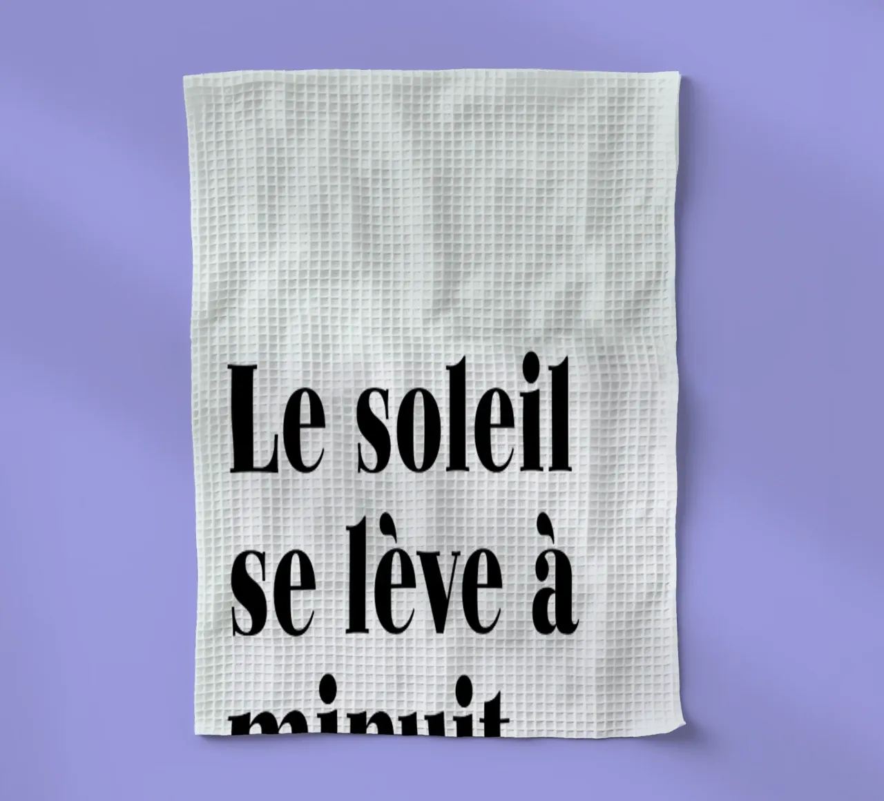 Le soleil se lève à minuit tea towel by typed