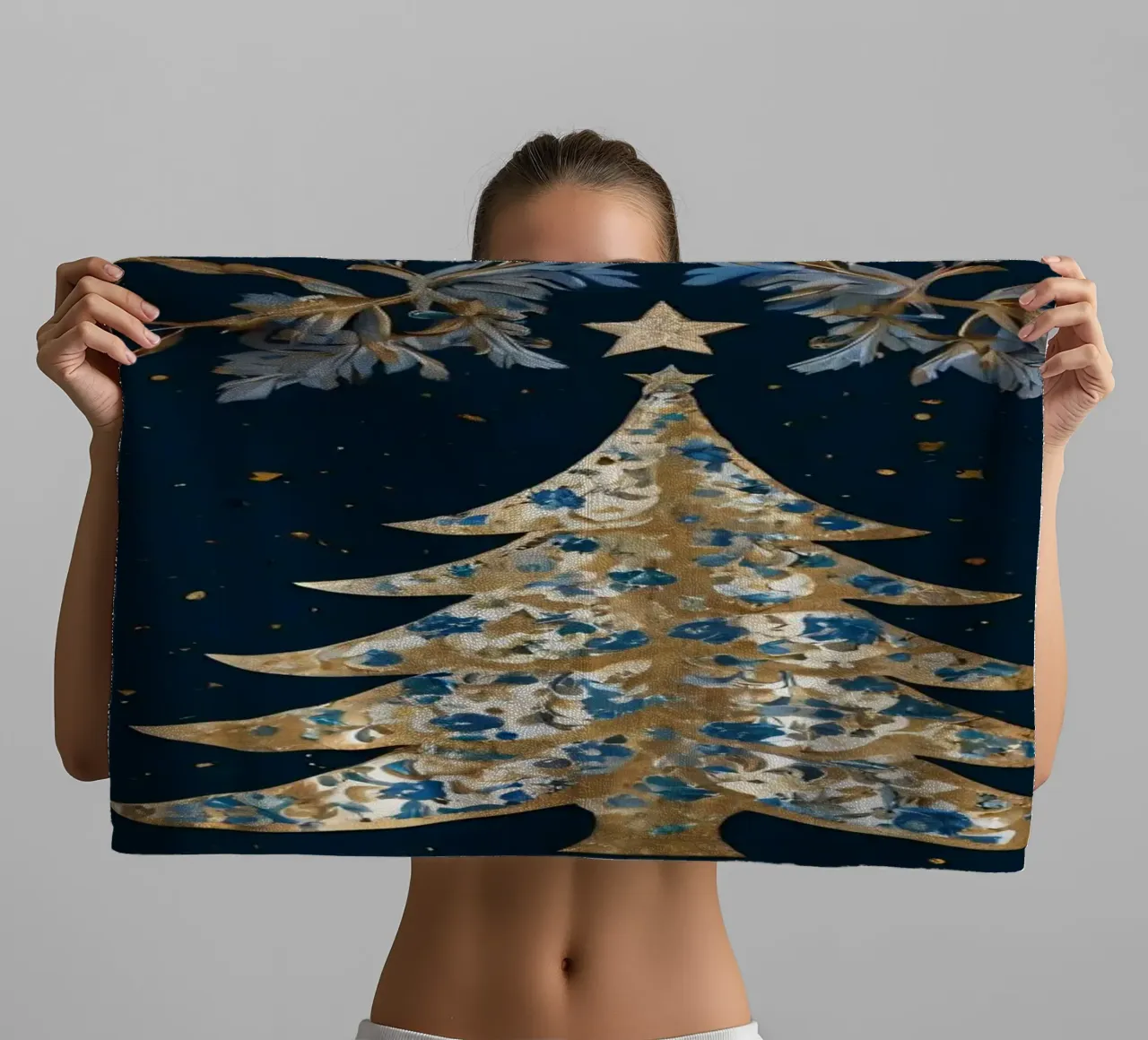 Elegant Christmas tree design surrounded by floral elements towel by DesignDoodle