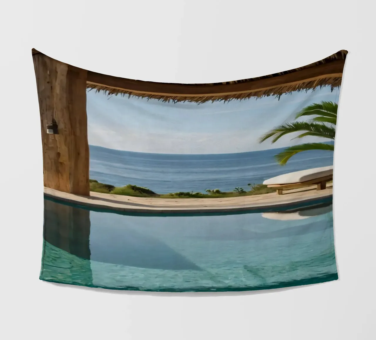 Relaxing by the tranquil poolside with ocean view fleece blanket by DesignDoodle