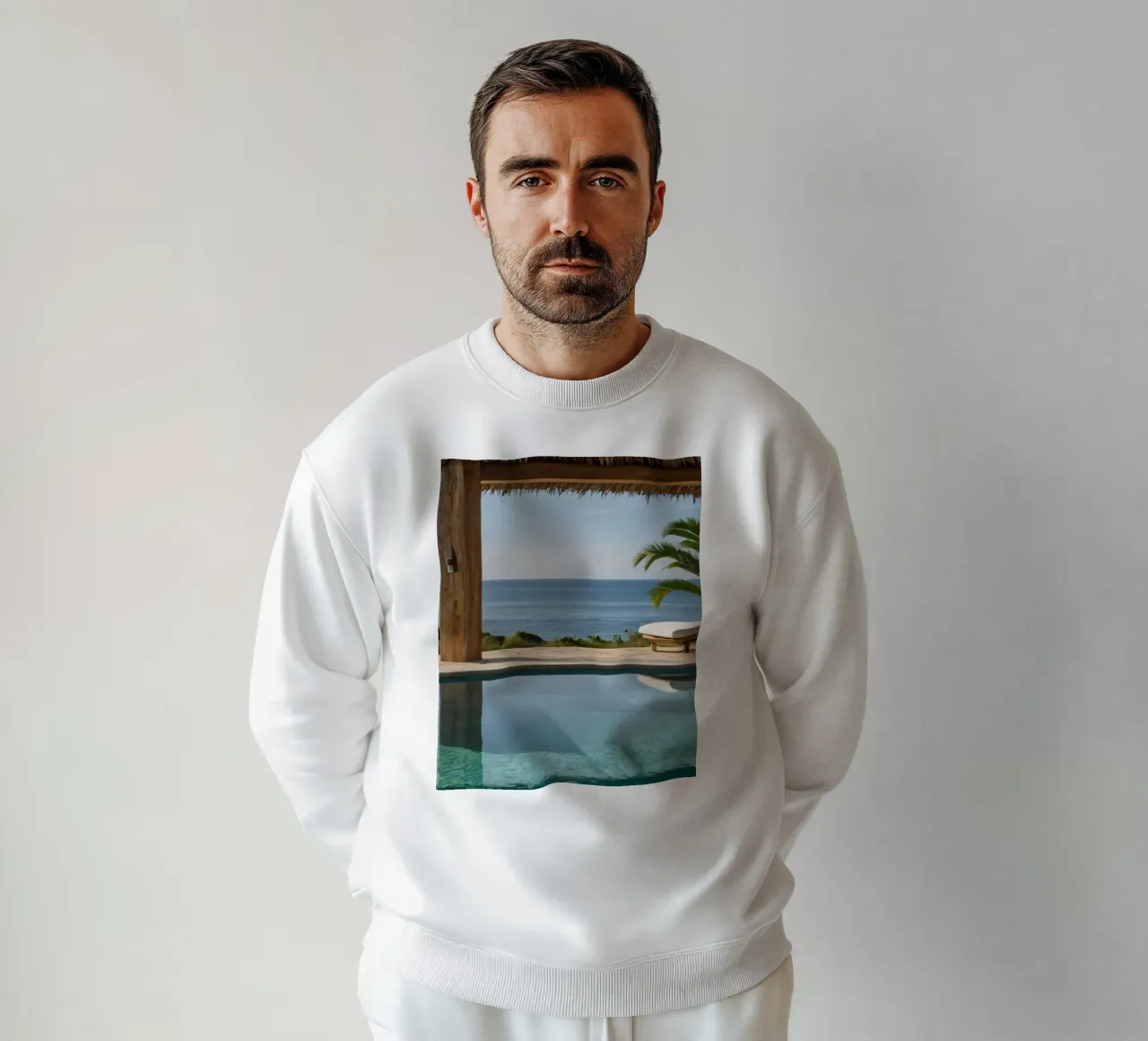 Relaxing by the tranquil poolside with ocean view sweatshirt by DesignDoodle
