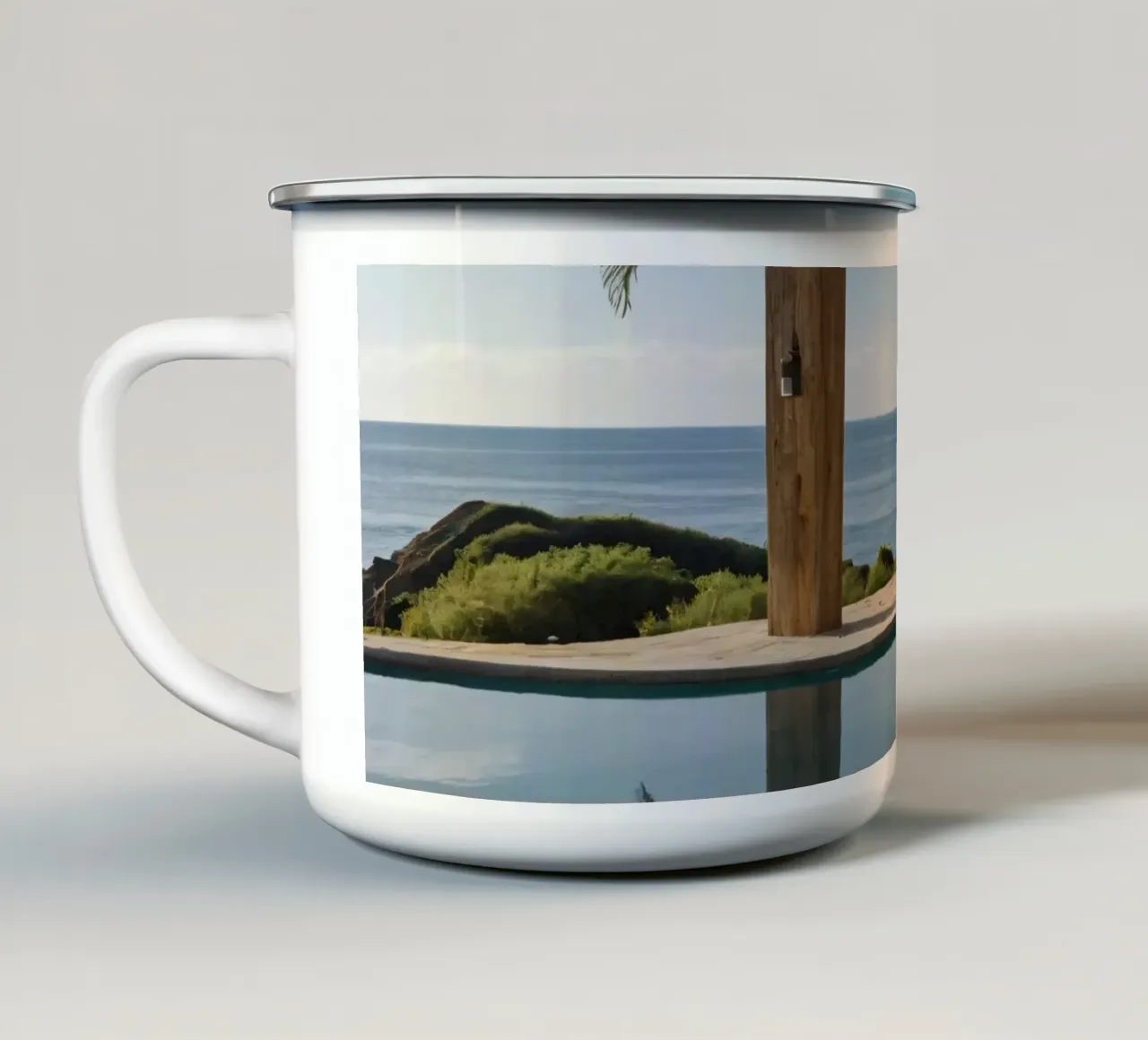 Relaxing by the tranquil poolside with ocean view enamel mug by DesignDoodle