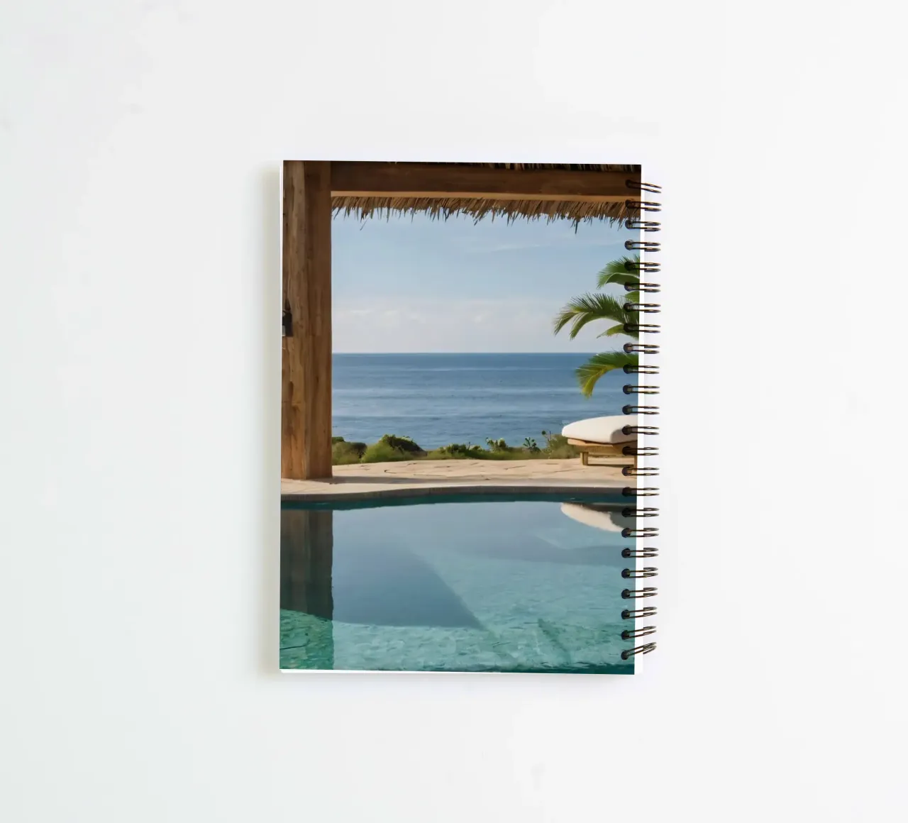 Relaxing by the tranquil poolside with ocean view spiral notebook by DesignDoodle