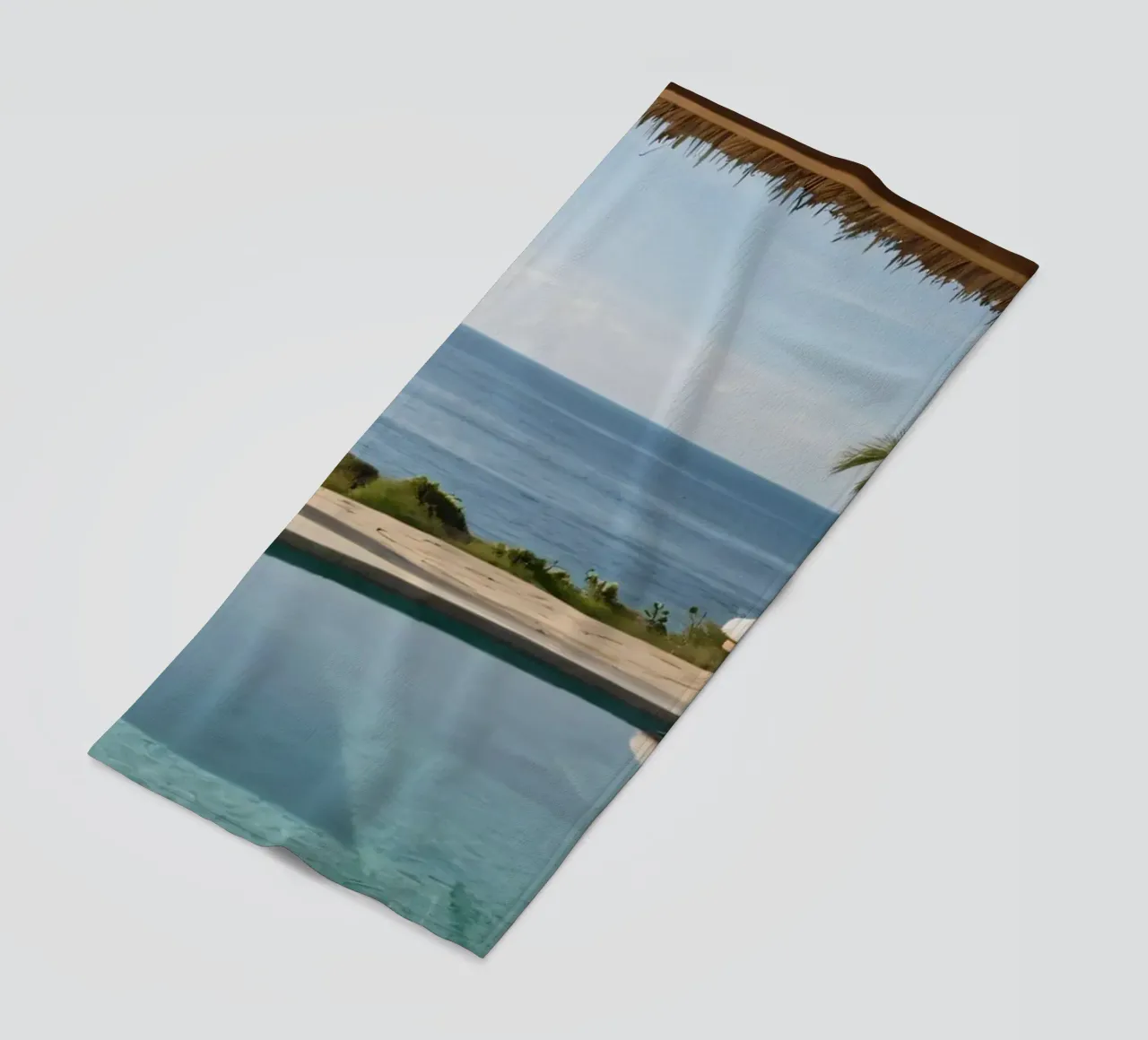 Relaxing by the tranquil poolside with ocean view beach towel by DesignDoodle
