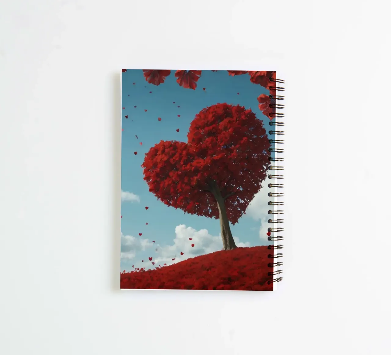 A lush red tree shaped like a heart surrounded red flowers spiral notebook by DesignDoodle