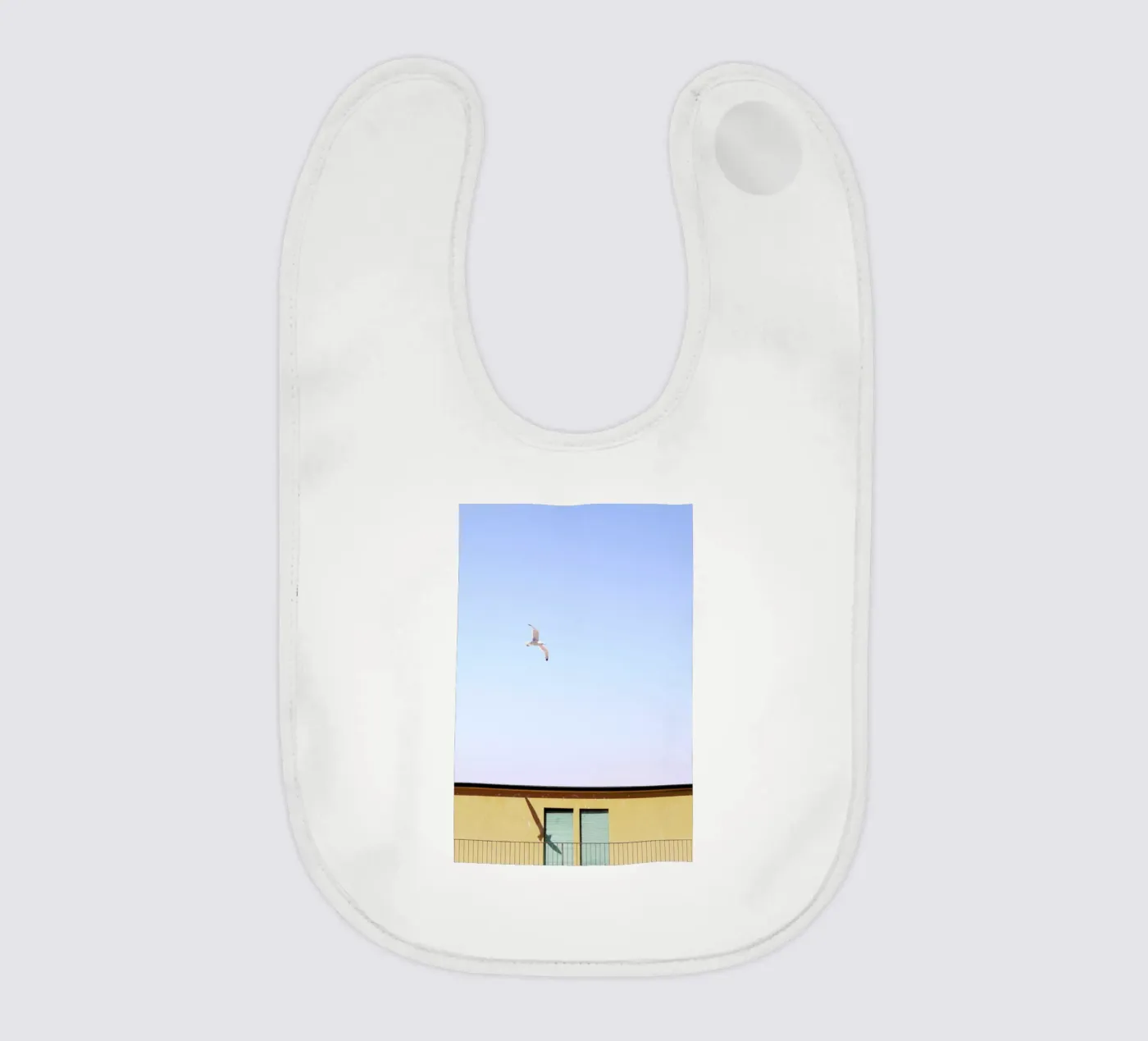 Checking In baby slabbetje van Rupert Höller