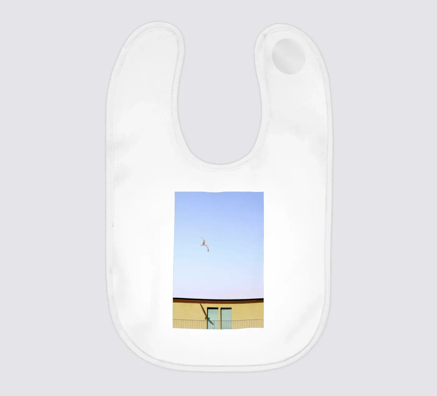 Checking In baby slabbetje van Rupert Höller