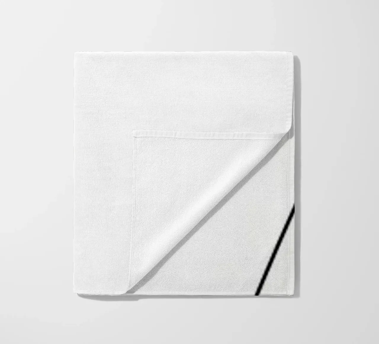 Woman holds coffee cup beach towel by Aiden Garcia