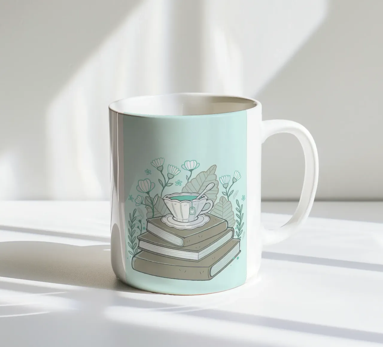 Libri e tè tazza in ceramica da Aiden Garcia