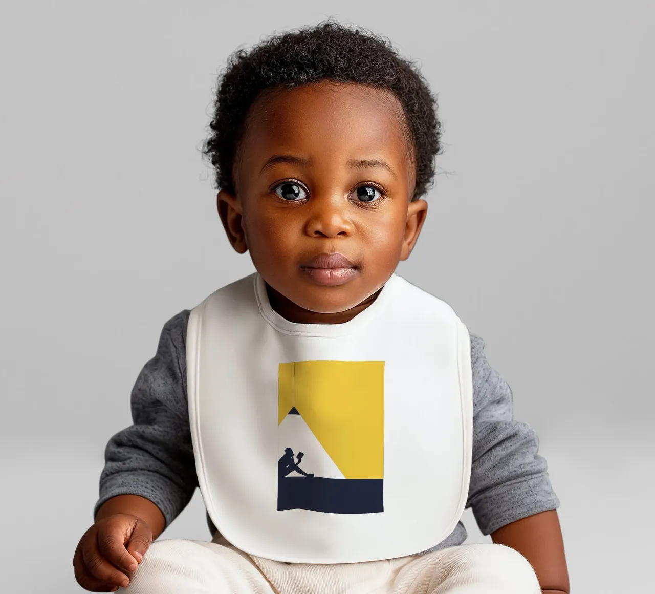 Silhouette Reading Under Light baby bib by Aiden Garcia