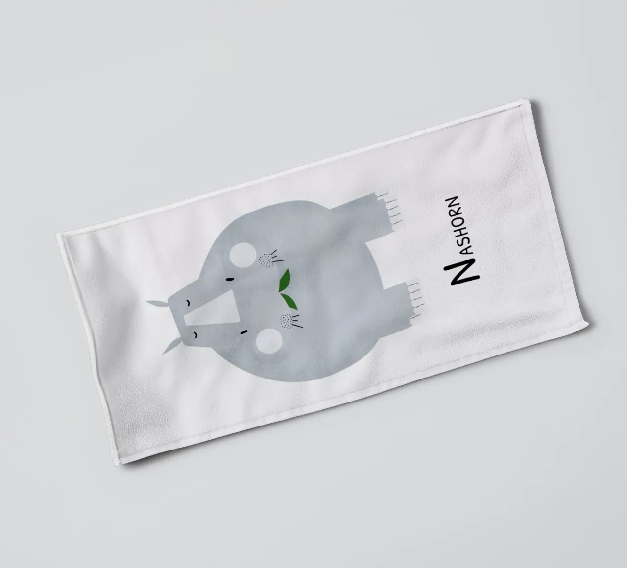 Nashorn towel by Little Flourishes