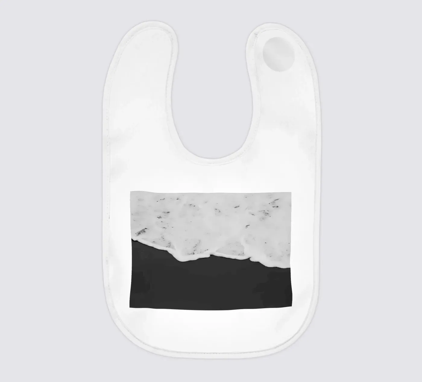 Wave baby bib by Matthew Katz