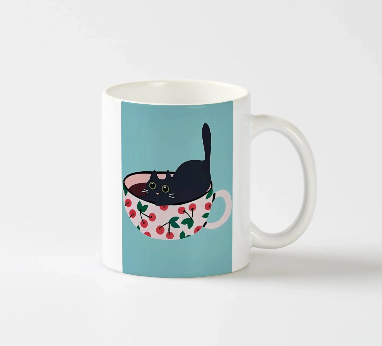 Chat noir dans une tasse de thé mug en céramique de Bartosz Powalka