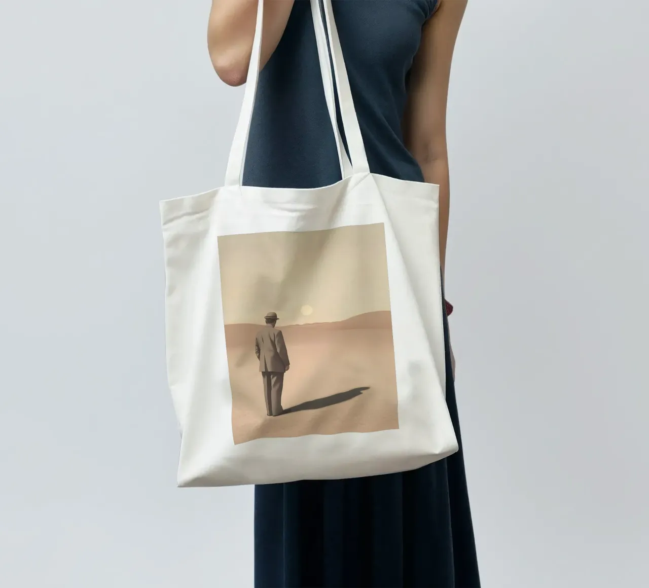 Shadow in the desert - Minimalist scene with man tote bag by Nikis Art Studio