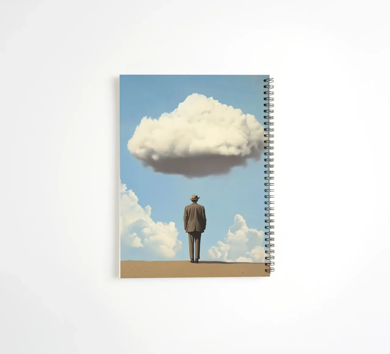 Man in the desert - Surrealistic scene with floating wo spiral notebook by Nikis Art Studio