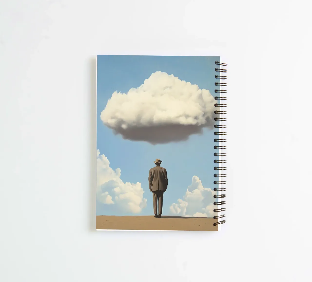 Man in the desert - Surrealistic scene with floating wo spiral notebook by Nikis Art Studio