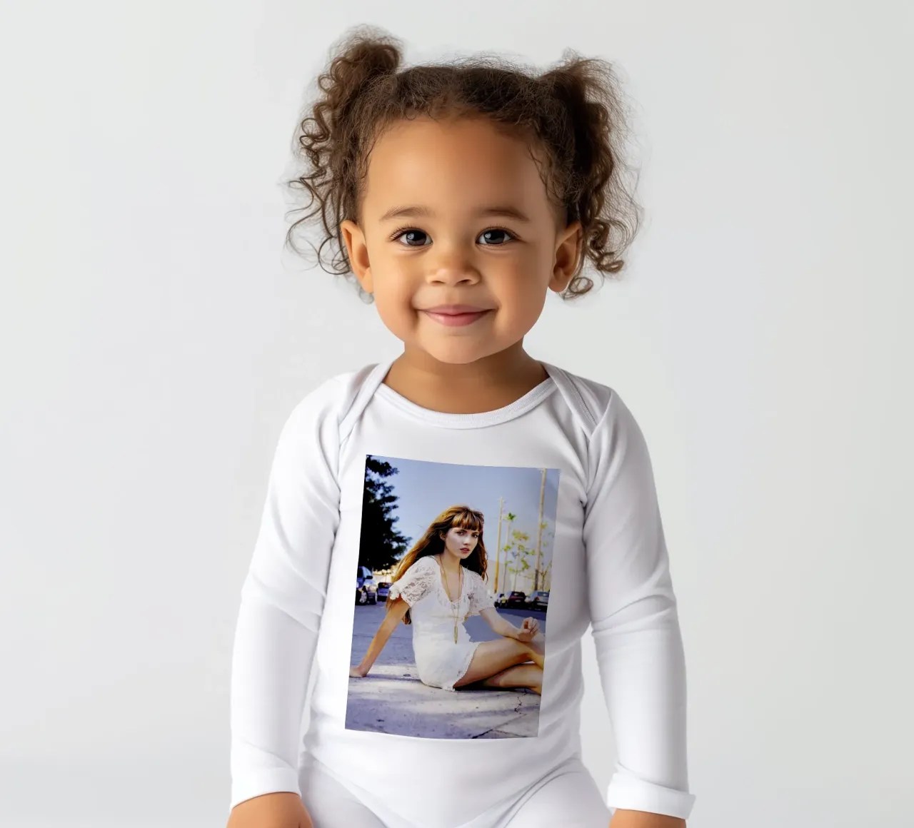 Portrait of a Girl long-sleeve baby romper by Aysha Banos