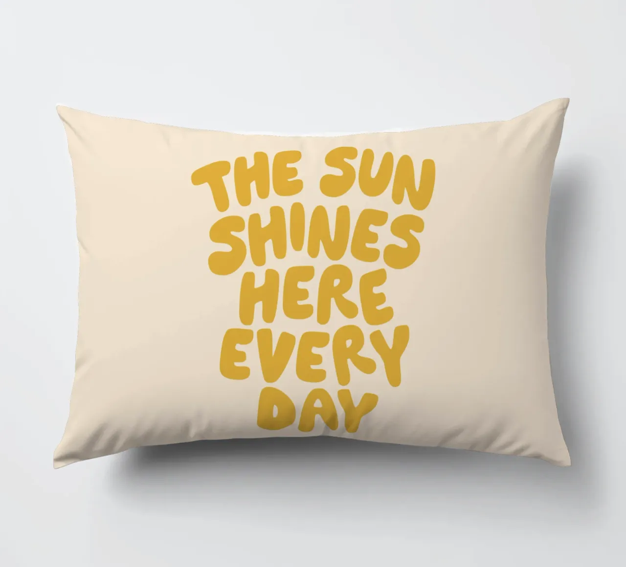 The Sun Shines Here Every Day Typography Print in Yellow decorative cushion by THE MOTIVATED TYPE